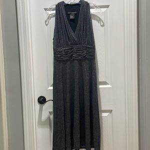 Size 8. Black/Charcoal/silver sparkle worn one time.  Very flattering